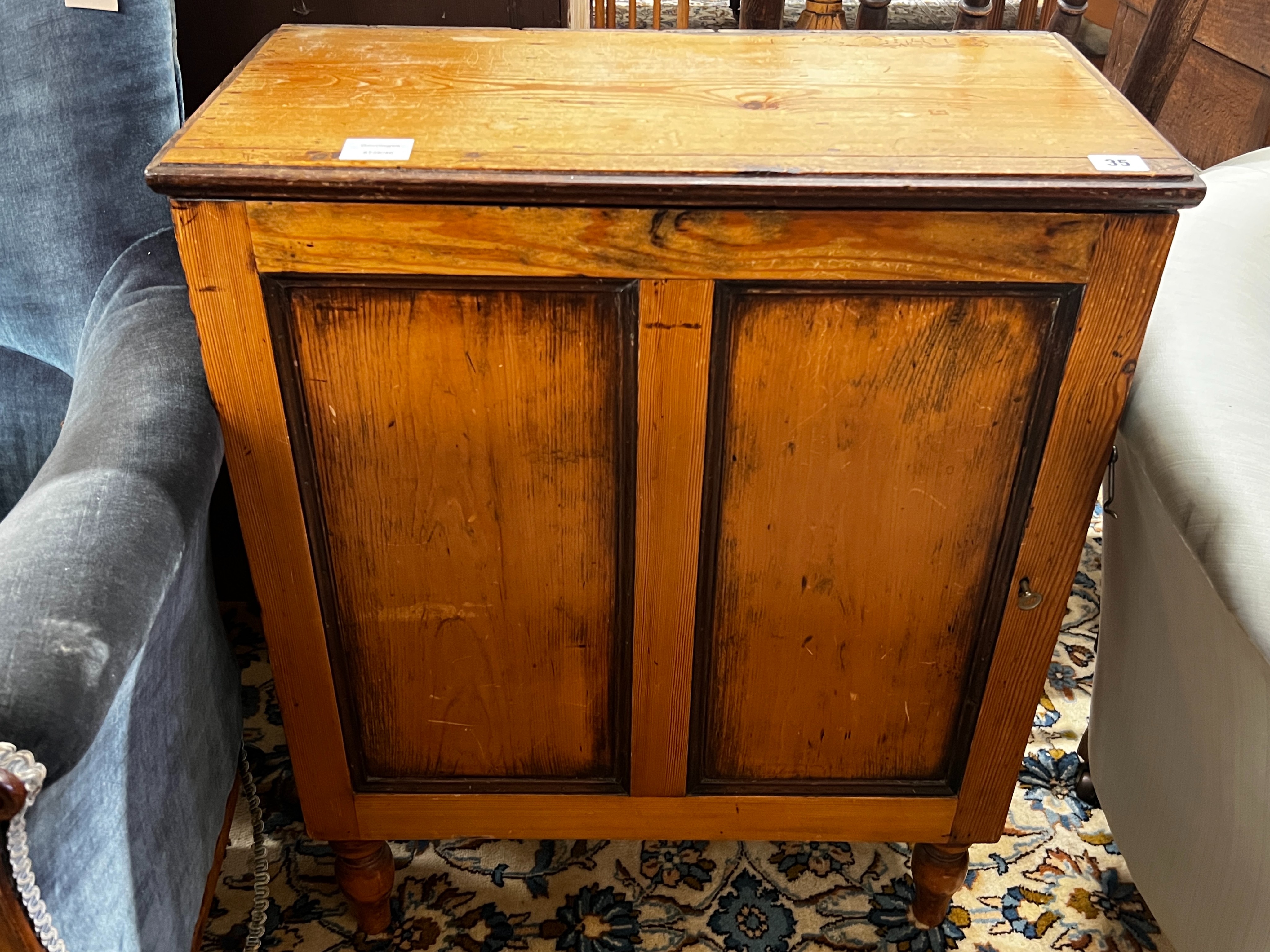 A 19th century French pine side cupboard with pigeonholed interior, width 63cm, depth 31cm, height 80cm